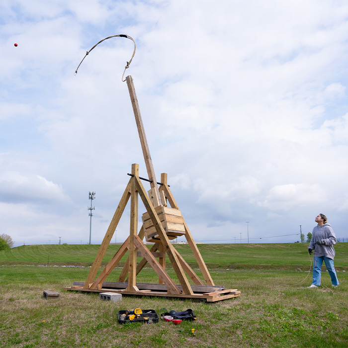 Student with trebuchet Student with trebuchet