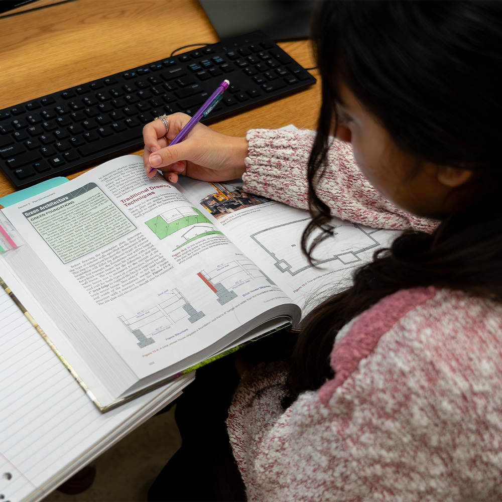 An engineering student in a CAD class.